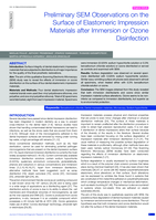 Preliminary SEM observations on the surface of elastomeric impression materials after immersion or ozone disinfection